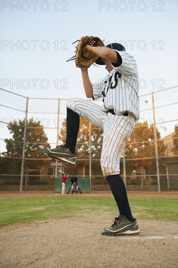 USA, California, Ladera Ranch, boy (10-11) playing baseball.