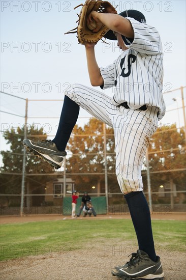 USA, California, Ladera Ranch, boy (10-11) playing baseball.