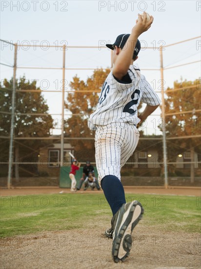 USA, California, Ladera Ranch, boy (10-11) playing baseball.