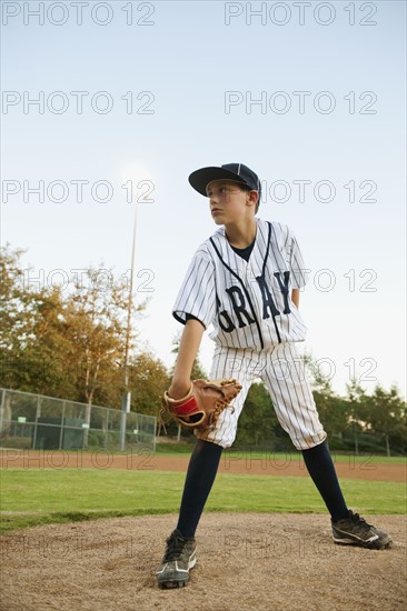 USA, California, Ladera Ranch, boy (10-11) playing baseball.