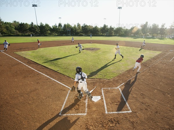 USA, California, little league baseball team (10-11) during baseball match.