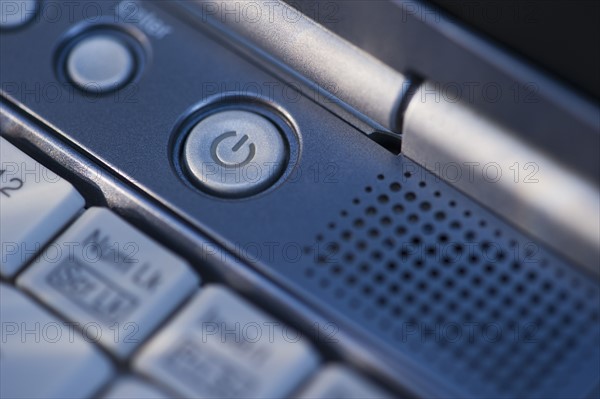 USA, New Jersey, Jersey City, Close-up view of laptop switch button. Photo : Daniel Grill