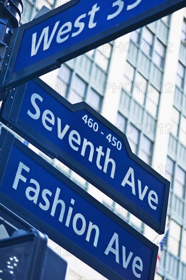 USA, New York, New York City, Street sign for Fashion Avenue and Seventh Avenue in Manhattan.