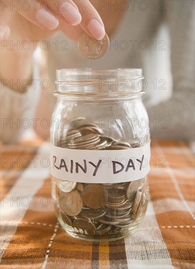 USA, New Jersey, Jersey City, Saving up for rainy day. Photo : Jamie Grill Photography