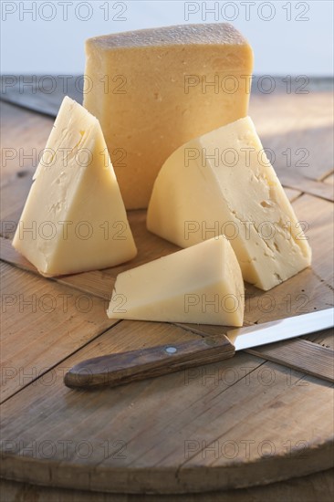 Cheese on chopping board.