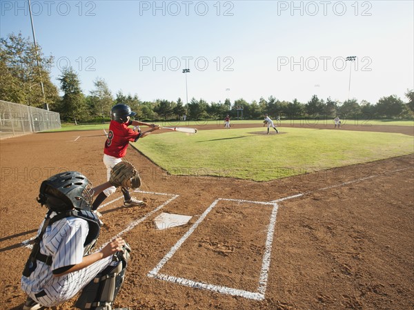 USA, California, little league baseball team (10-11) during baseball match.