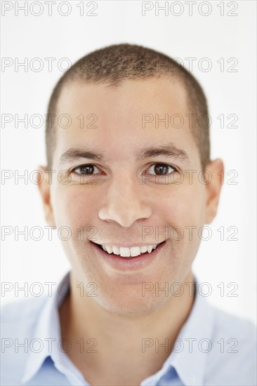 South Africa, Portrait of smiling young man. Photo : momentimages