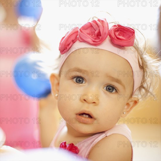 Portrait of girl (2-3) wearing headband with roses. Photo : FBP