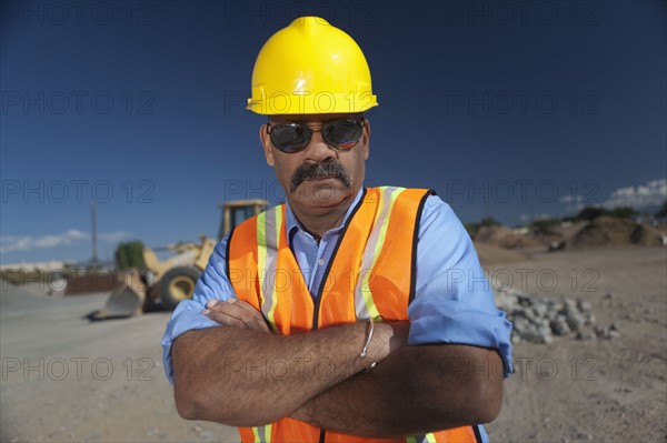 Portrait of construction worker on building site. Photo : Dan Bannister