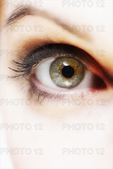 Woman's open eye, close up.