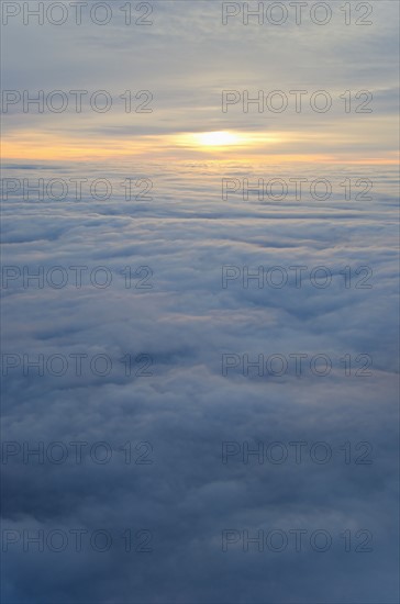 Sunrise over clouds.