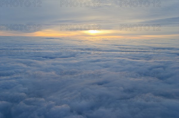 Sunrise over clouds.