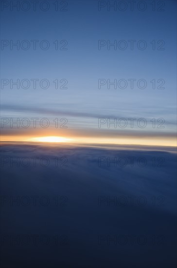 Sunrise over clouds.