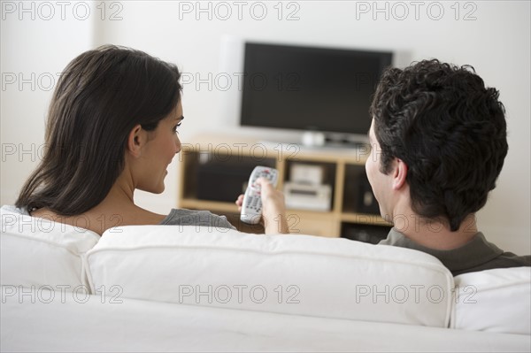 Couple watching tv.