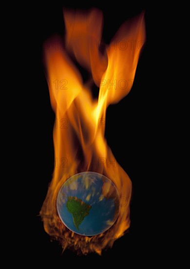 Studio Shot of burning globe. Photo : Mike Kemp