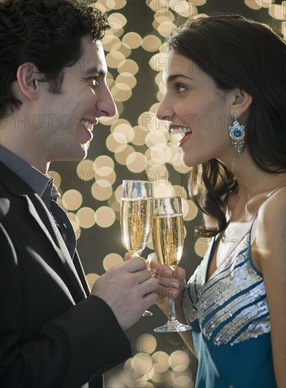 Young happy couple celebrating New Year's Eve.