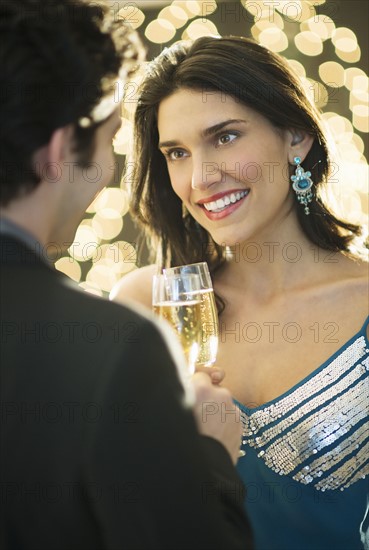 Young happy couple celebrating New Year's Eve.