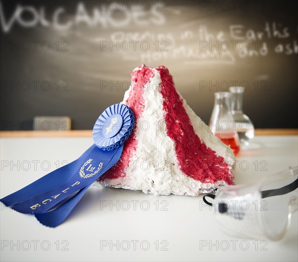 Close up of model with award ribbon. Photo : Jamie Grill Photography