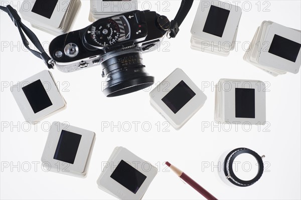 Studio Shot of slides and camera.