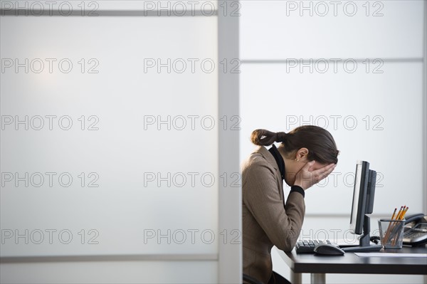 Portrait of young woman in office.