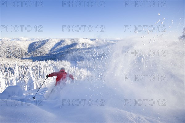 USA, Montana, Whitefish, skier on slope. Photo : Noah Clayton