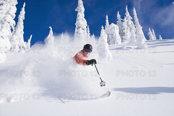 USA, Montana, Whitefish, skier on slope. Photo : Noah Clayton