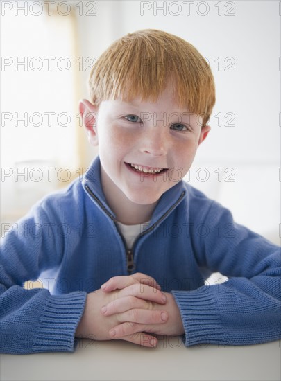 Portrait of smiling boy (8-9) . Photo : Jamie Grill Photography