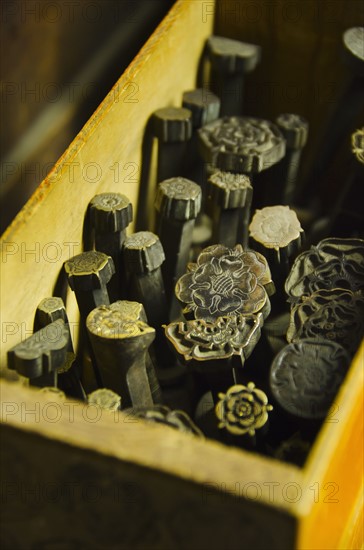 Close up of printing blocks from antique book binding.