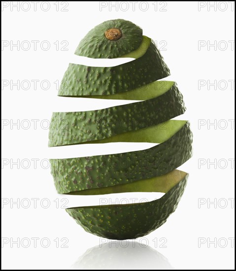 Avocado peel in avocado shape, studio shot. Photo : Mike Kemp
