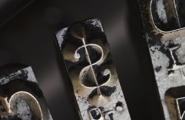 Close up of dollar sign on typewriter key.