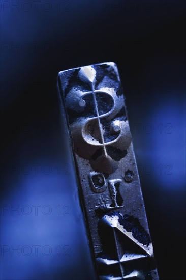 Close up of dollar sign on typewriter key.