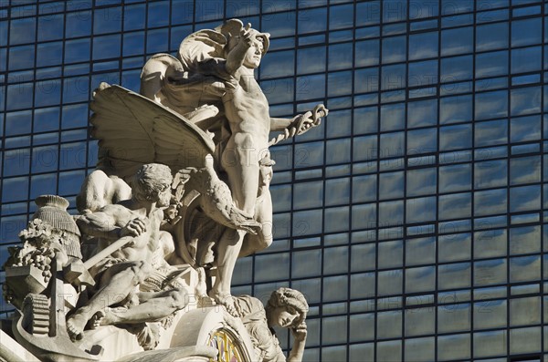 USA, New York City, Sculpture on top of Grand Central Station facade.