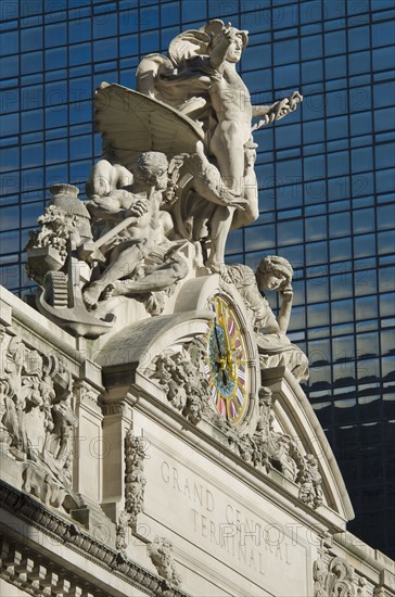 USA, New York City, Sculpture on top of Grand Central Station facade.