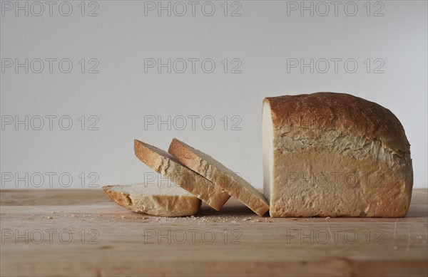 Close up of bread slices on cutting board.