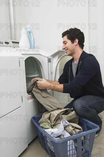 Man doing laundry.