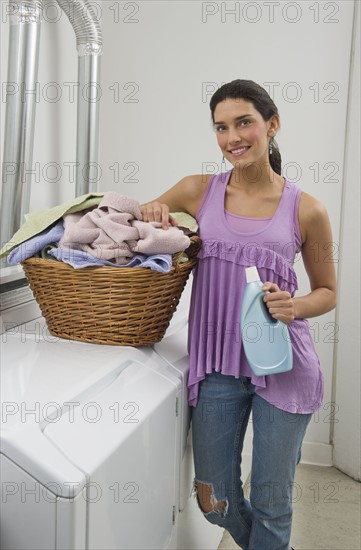 Woman doing laundry.