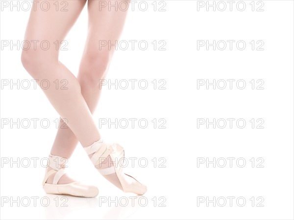 Ballet dancer's legs, studio shot. Photo : Dan Bannister