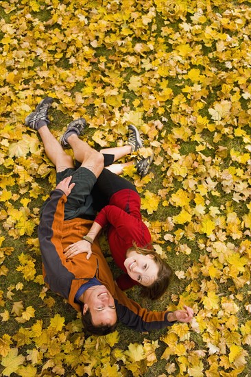 USA, Montana, Kalispell, Happy couple embracing in autumn. Photo : Noah Clayton