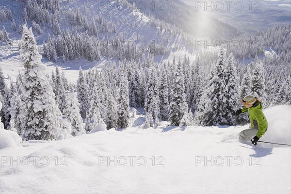 USA, Montana, Whitefish, skier on slope. Photo : Noah Clayton