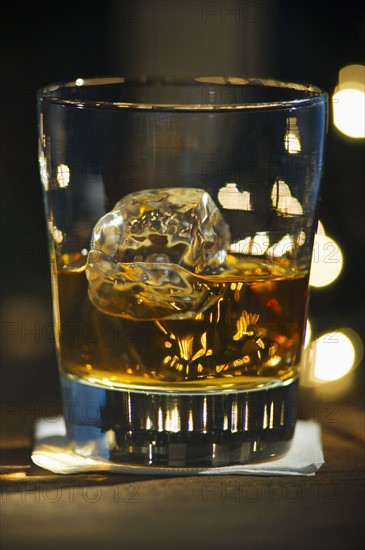 Close-up view of bourbon on bar counter.