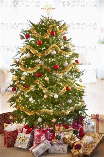 Colorful gifts under christmas tree.