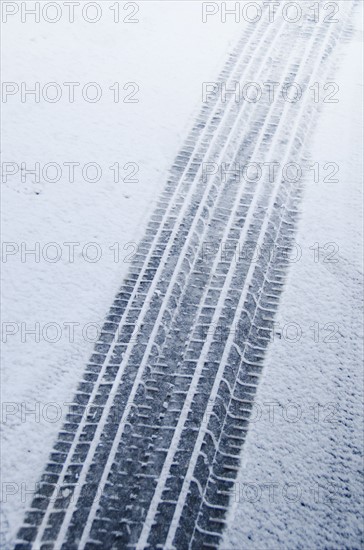 Tire tracks in snow.