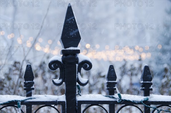 USA, New York State, New York City, antique fence covered with snow.