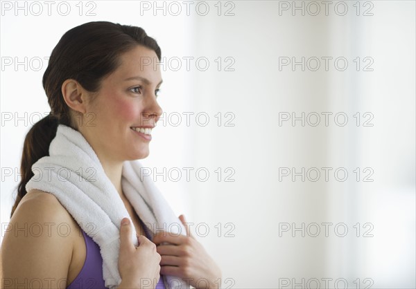 Happy young woman at fitness.