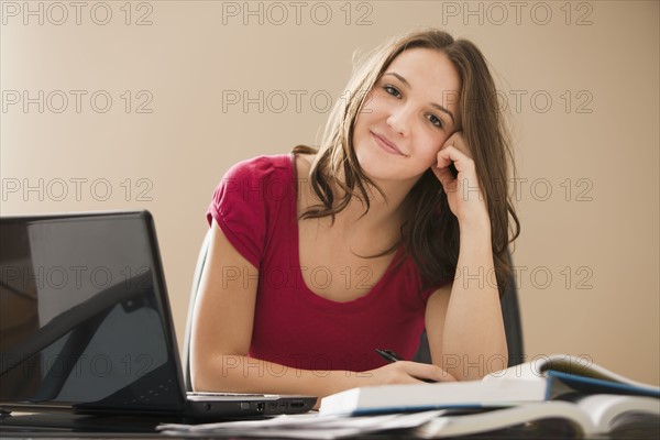 Young woman studying. Photo : Mike Kemp