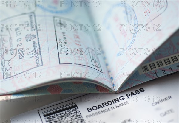 Passport with boarding pass inside.