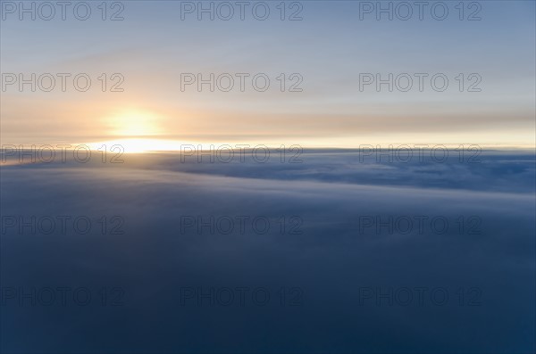 Sunrise over clouds.