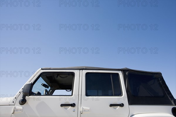 USA, Massachusetts, close up of jeep against blue sky. Photo : Chris Hackett