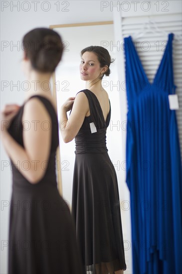 Woman fitting new dress.