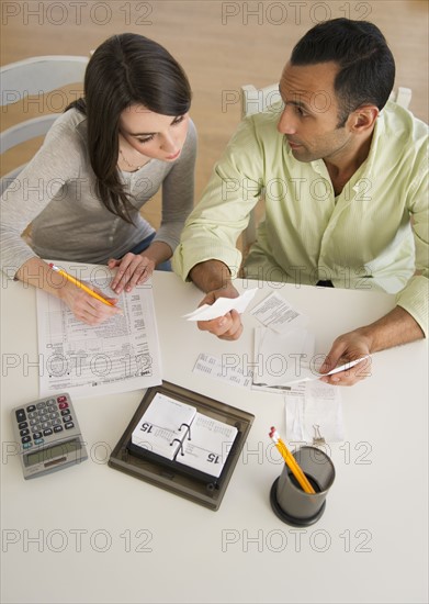 Couple doing taxes.